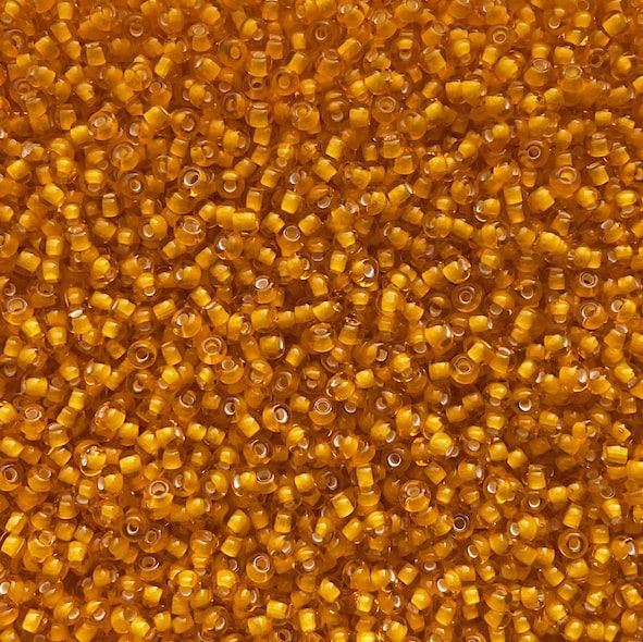 RC1124 Marigold w White Lining size 10 seed bead
