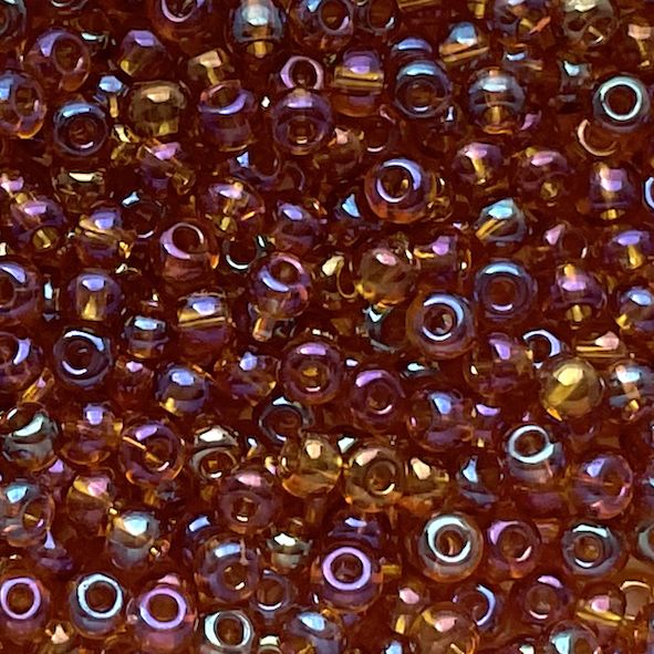 RC272 Trans Dark Topaz AB Size 6 Seed Beads